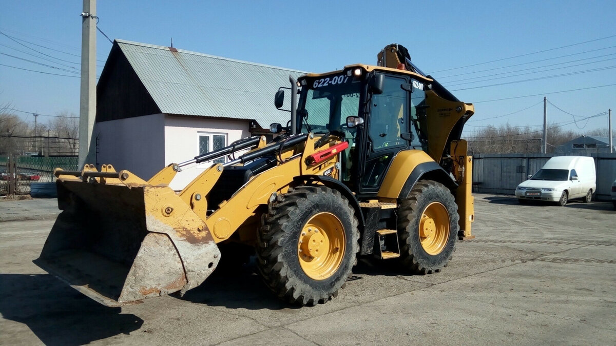 Катерпиллер купить трактор обработка земли минитрактор