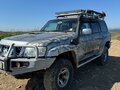 2005 Nissan Patrol V (Y61) Рестайлинг, серый - вид 1