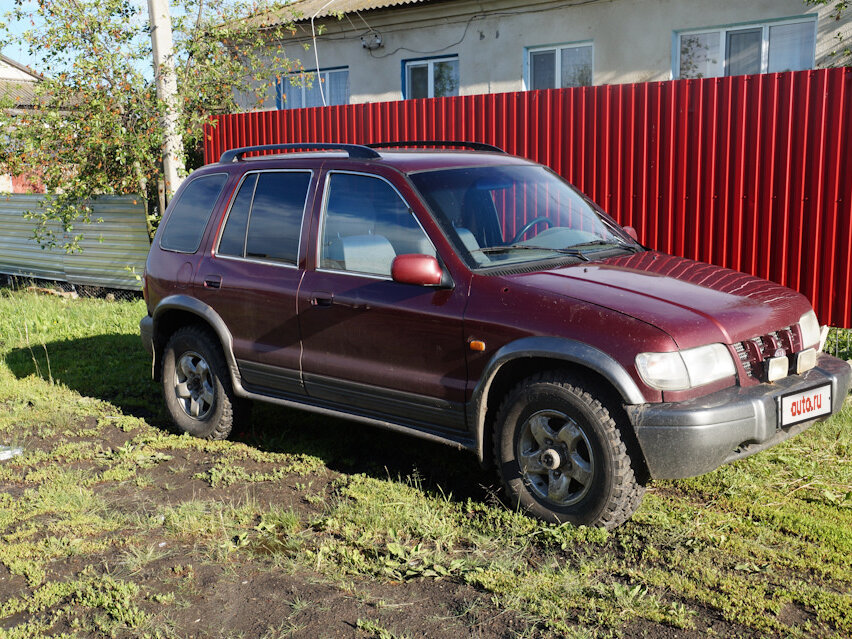 Купить б/у Kia Sportage I 2.0 AT (128 л.с.) 4WD бензин автомат в Москве: пурпурн