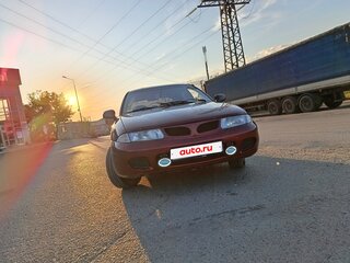 1998 Mitsubishi Carisma I, пурпурный, 240000 рублей, вид 1