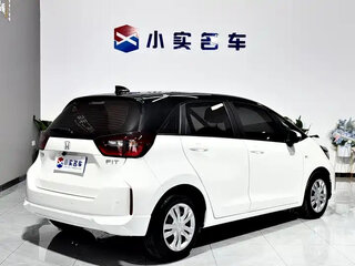 2023 Honda Fit IV Рестайлинг, белый, 972000 рублей, вид 4