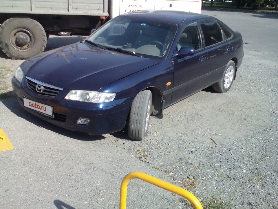 Машина Mazda 627