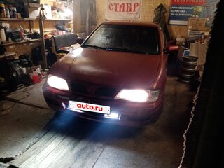 1997 Nissan Primera II (P11), красный, 65000 рублей, вид 1
