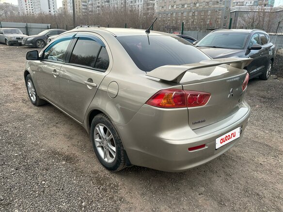 2007 Mitsubishi Lancer X, бежевый, 700000 рублей - вид 1