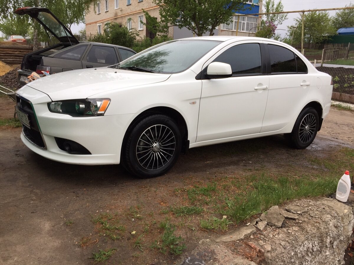 Lancer 10 белый Рестайлинг