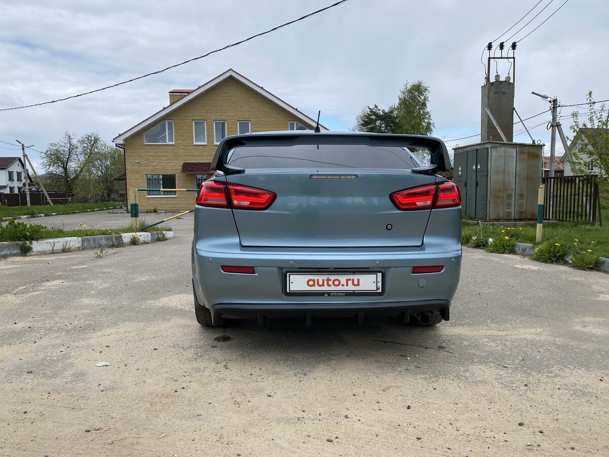 Митсубиси лансер голубой