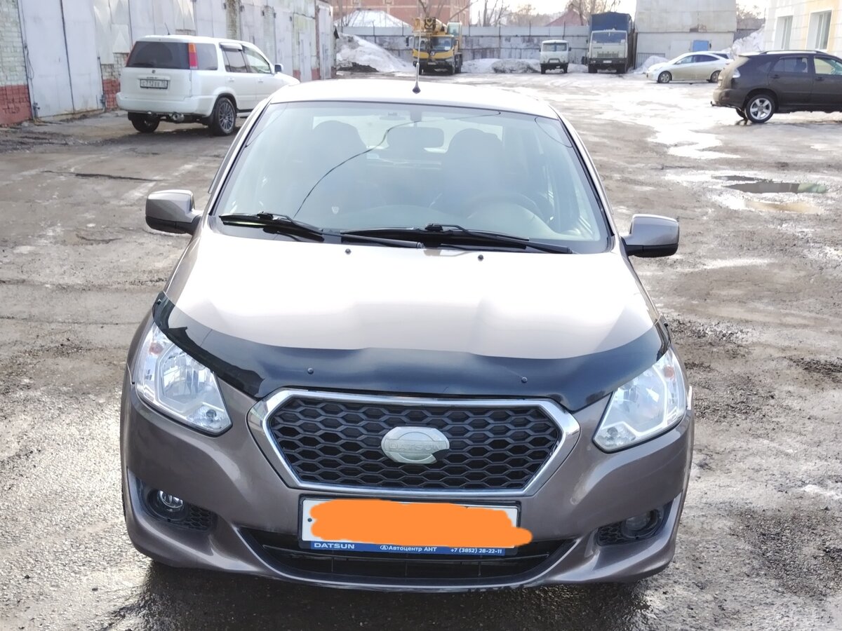 Купить б/у Datsun on-DO I 1.6 AT (87 л.с.) бензин автомат в Томске ...