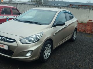 2012 Hyundai Solaris I, золотистый, 945000 рублей, вид 1
