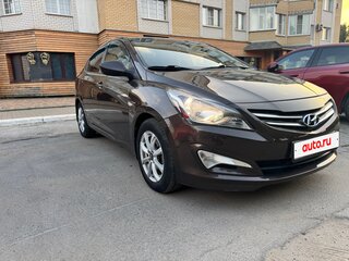 2014 Hyundai Solaris I Рестайлинг, коричневый, 855000 рублей, вид 3