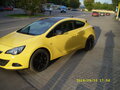 2013 Opel Astra GTC J Рестайлинг, жёлтый - вид 1