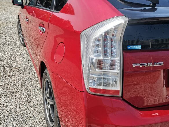 2010 Toyota Prius III (XW30), красный, 1100000 рублей - вид 7