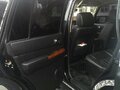 2007 Nissan Patrol V (Y61) Рестайлинг, чёрный - вид 6