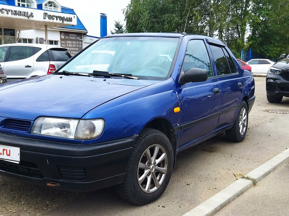 Купить б/у Nissan Sunny N14 1.4 MT (75 л.с.) бензин механика в ...