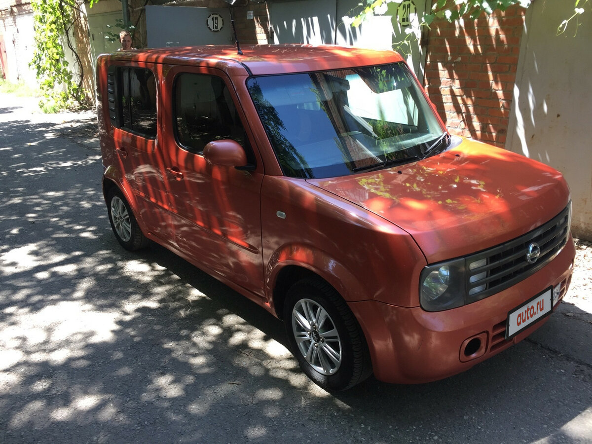 Подержанный Nissan Cube II (Z11) 1.4 AT (98 л.с.) бензин автомат, оранжевый компактвэ...