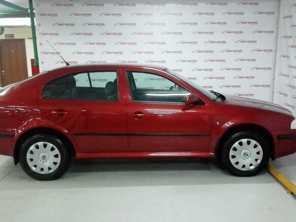 2010 Skoda Octavia I (A4) Рестайлинг, красный - вид 6