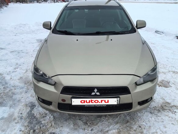 2007 Mitsubishi Lancer X, золотистый, 720000 рублей - вид 2