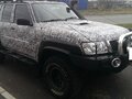 2007 Nissan Patrol V (Y61) Рестайлинг, чёрный - вид 1