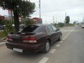 1998 Nissan Maxima IV (A32), красный - вид 3