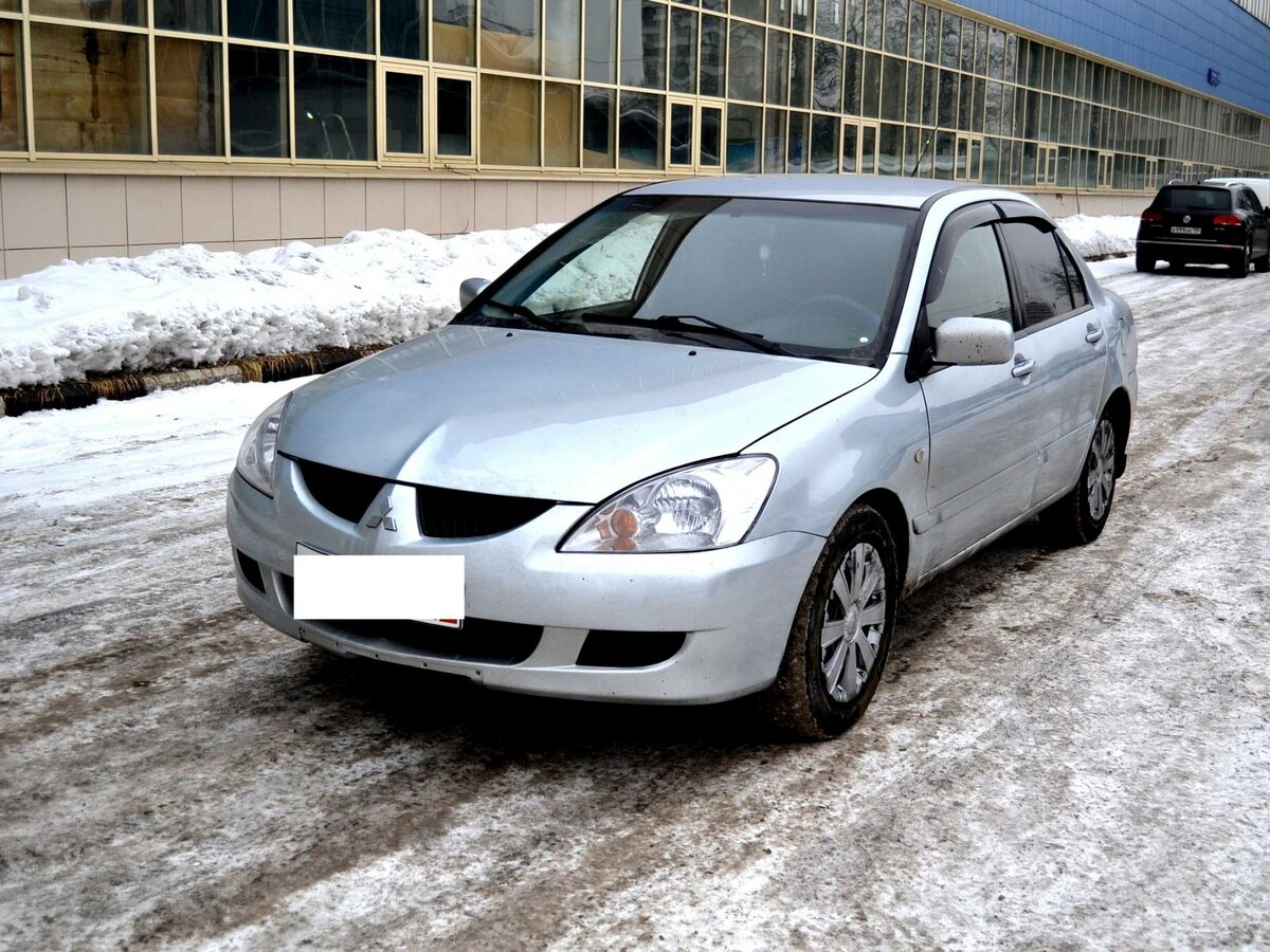 Минусы лансер 2005 года