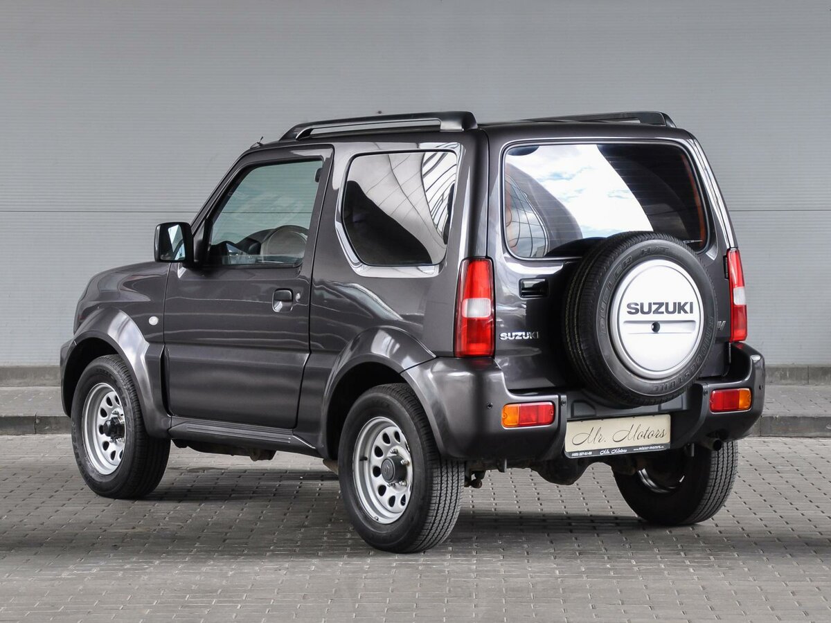 2014 Suzuki Jimny III Рестайлинг 2, серый - вид 4.