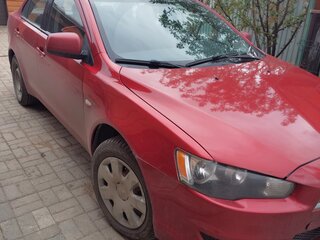 2007 Mitsubishi Lancer X, красный, 700000 рублей, вид 1