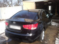 2009 Kia Cerato 4-speed II, чёрный - вид 1
