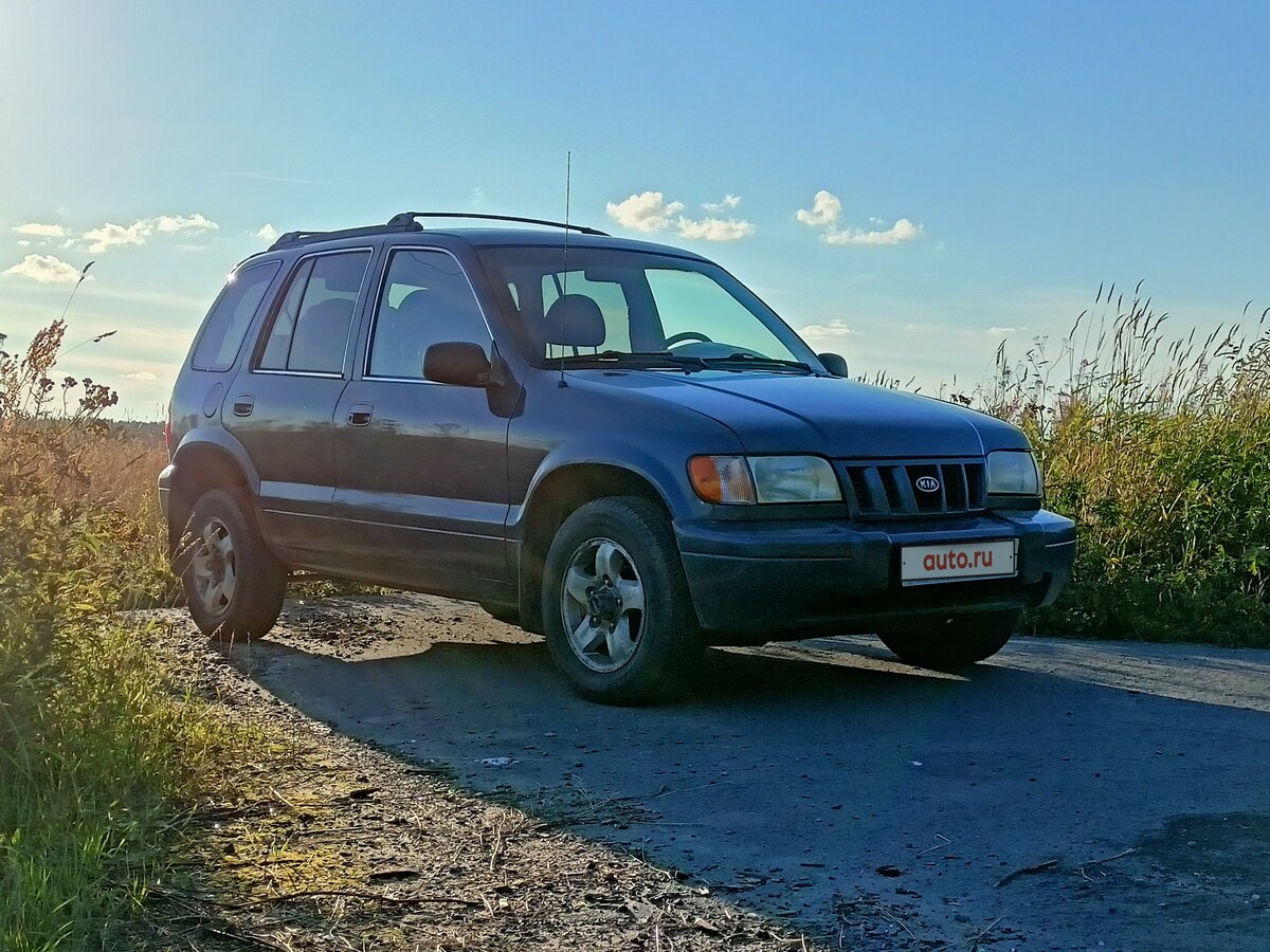 Купить б/у Kia Sportage I Grand 2.0 MT (128 л.с.) 4WD бензин механика в Москве: 