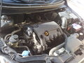 2009 Kia Cerato 4-speed II, чёрный - вид 9
