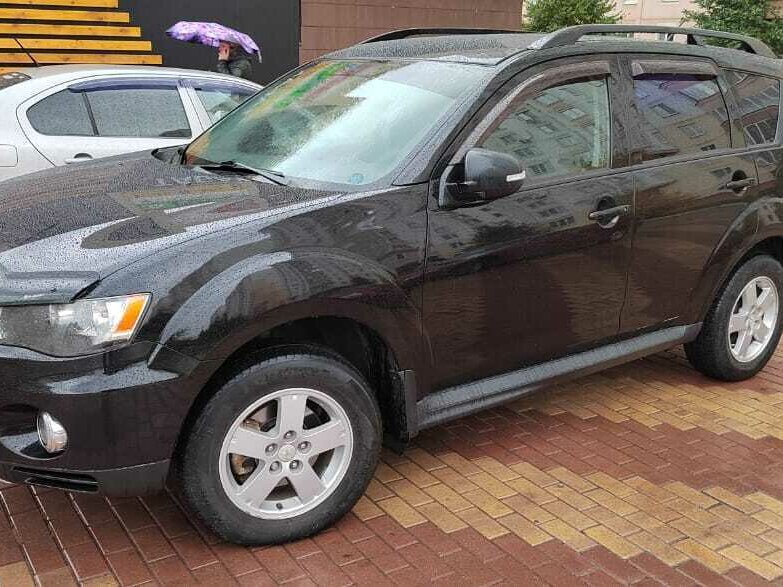 Купить б/у Mitsubishi Outlander II Рестайлинг 2.4 CVT (170 л.с.) 4WD ...