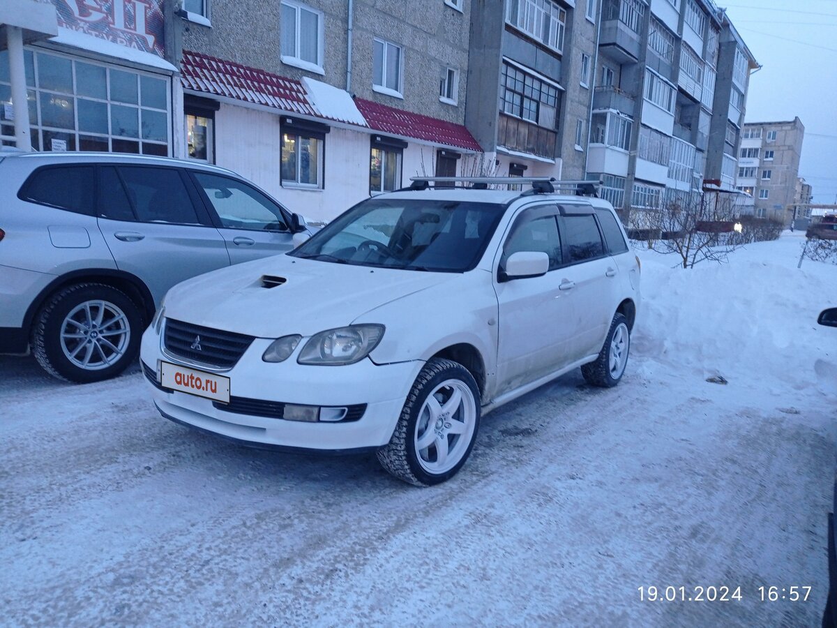 Купить б/у Mitsubishi Airtrek I 2.4 AT (139 л.с.) 4WD бензин автомат в ...