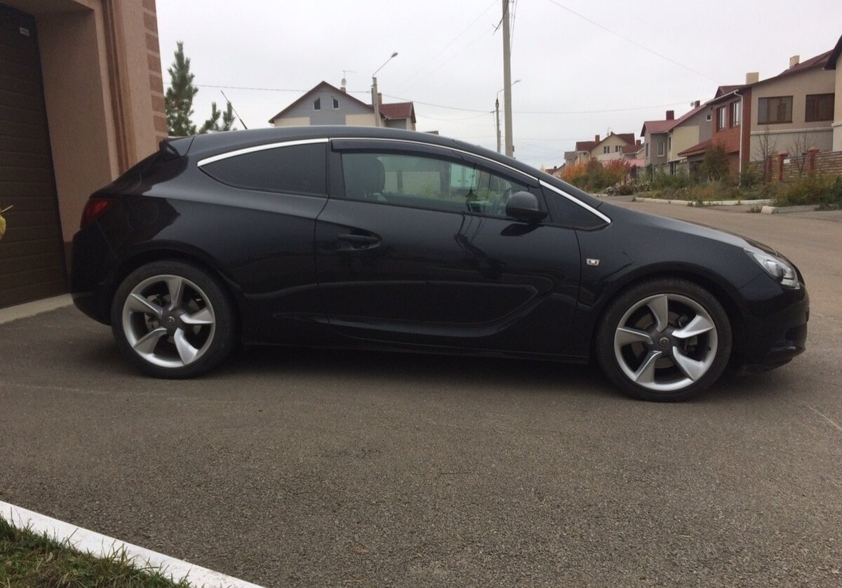Какая резина на опель астра gtc 2012г