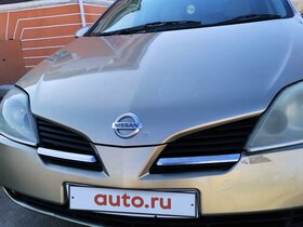 Ниссан примера золотистый