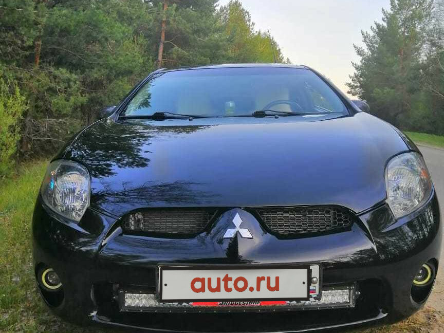 Купить б/у Mitsubishi Eclipse IV 2.4 AT (162 л.с.) бензин