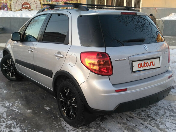 2012 Suzuki SX4 I (Classic) Рестайлинг, серебристый - вид 2