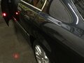1997 BMW 7 серии 728i III (E38), чёрный - вид 2