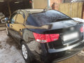 2009 Kia Cerato 4-speed II, чёрный - вид 2