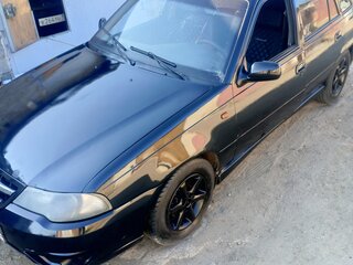 2009 Daewoo Nexia I Рестайлинг, чёрный, 60000 рублей, вид 1