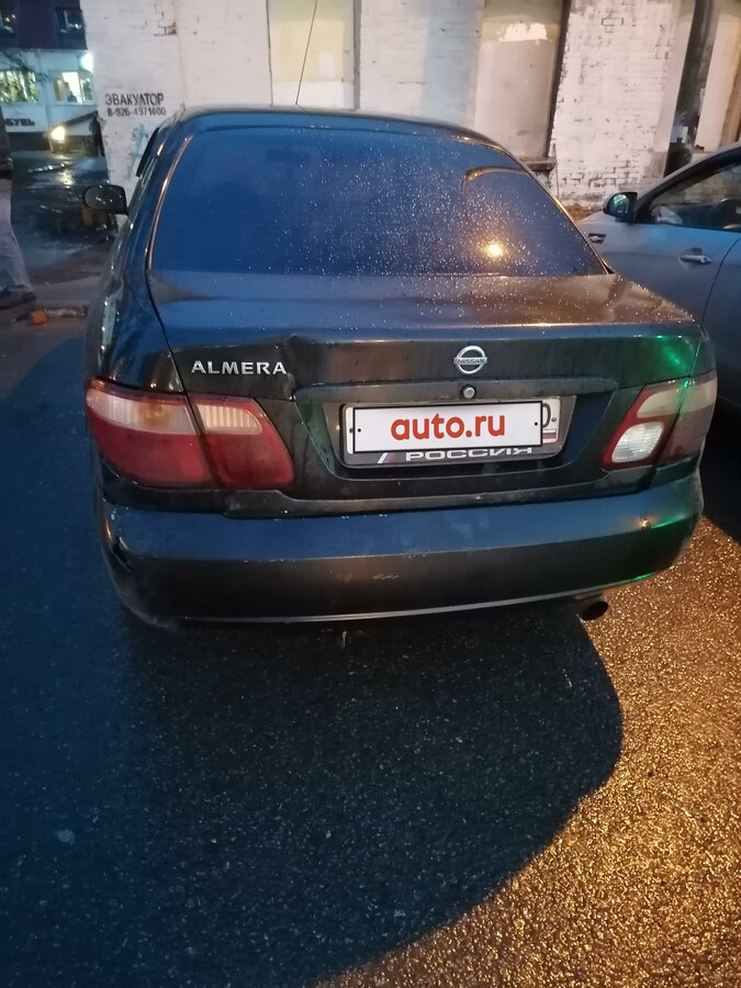 Ниссан черный седан