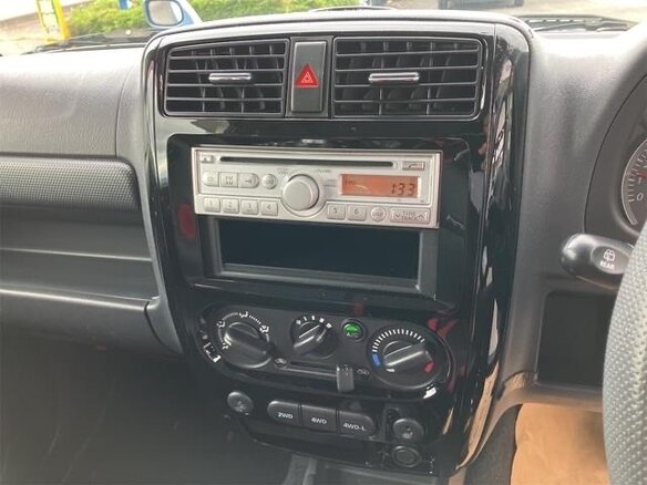 2010 Suzuki Jimny Kei car III Рестайлинг 1, голубой - вид 14