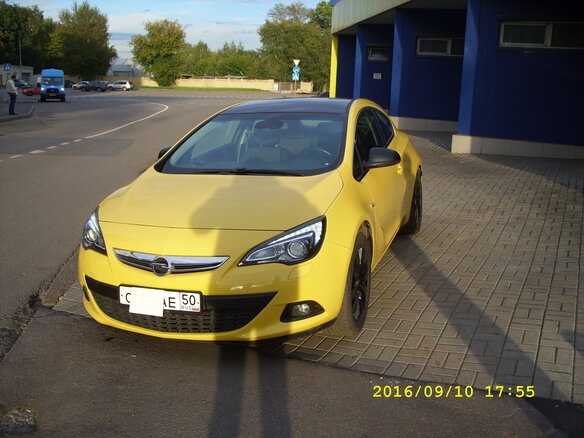 2013 Opel Astra GTC J Рестайлинг, жёлтый