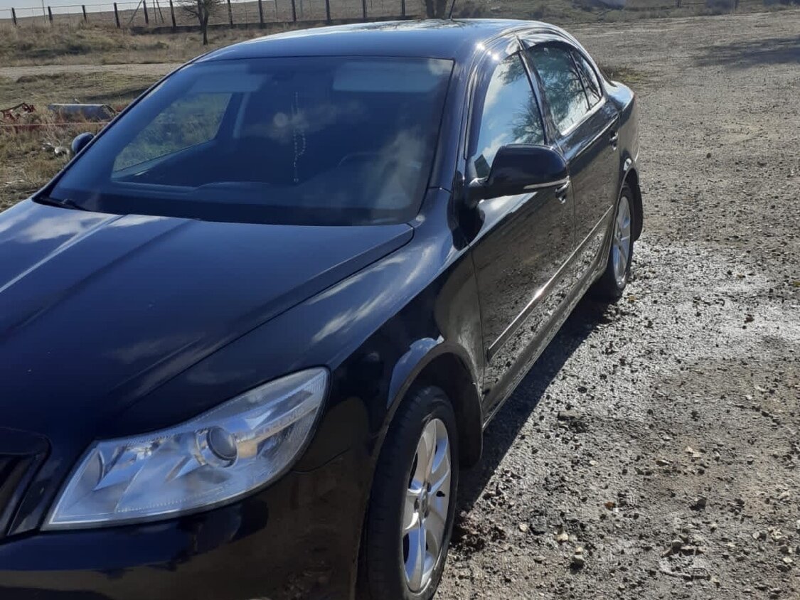Купить б/у Skoda Octavia II (A5) Рестайлинг 1.6 MT (102 л.с.) бензин ...