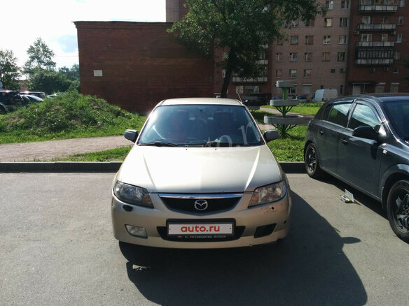 2003 Mazda 323 VI (BJ) Рестайлинг, бежевый - вид 1