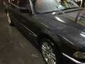 1997 BMW 7 серии 728i III (E38), чёрный - вид 7