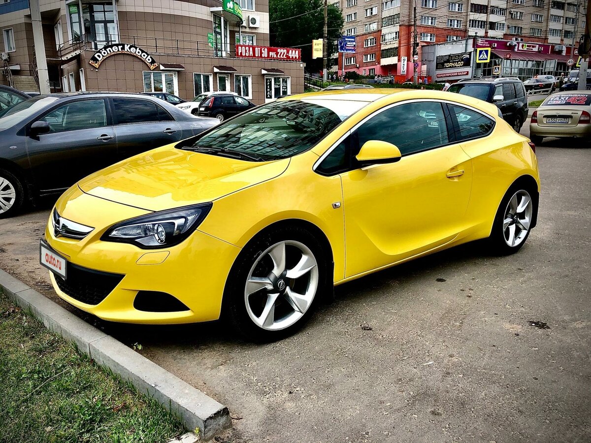 Опель астра gtc какой двигатель лучше