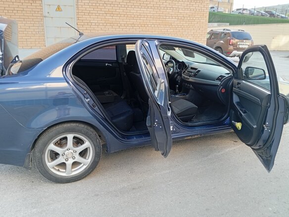 2008 Mitsubishi Lancer X, синий, 595000 рублей - вид 22