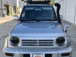 1997 Mitsubishi Pajero Junior, серый, 620000 рублей, вид 1