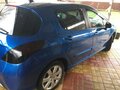 2009 Peugeot 308 I, синий - вид 1