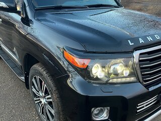 2014 Toyota Land Cruiser 200 Series Рестайлинг 1, чёрный, 4300000 рублей, вид 1