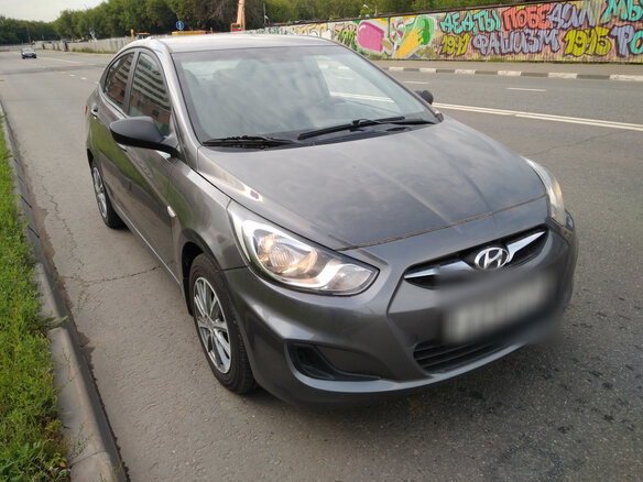 2011 Hyundai Solaris I, серый - вид 1