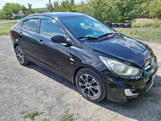2012 Hyundai Solaris I, чёрный, 720000 рублей, вид 1